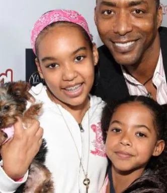 Miguel with his two daughters